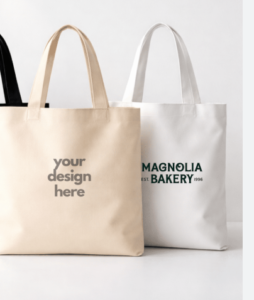 Three tote bags displayed, each featuring a unique design and color pattern.