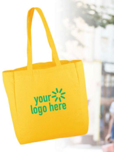 Yellow tote bag featuring your logo prominently displayed on the front.